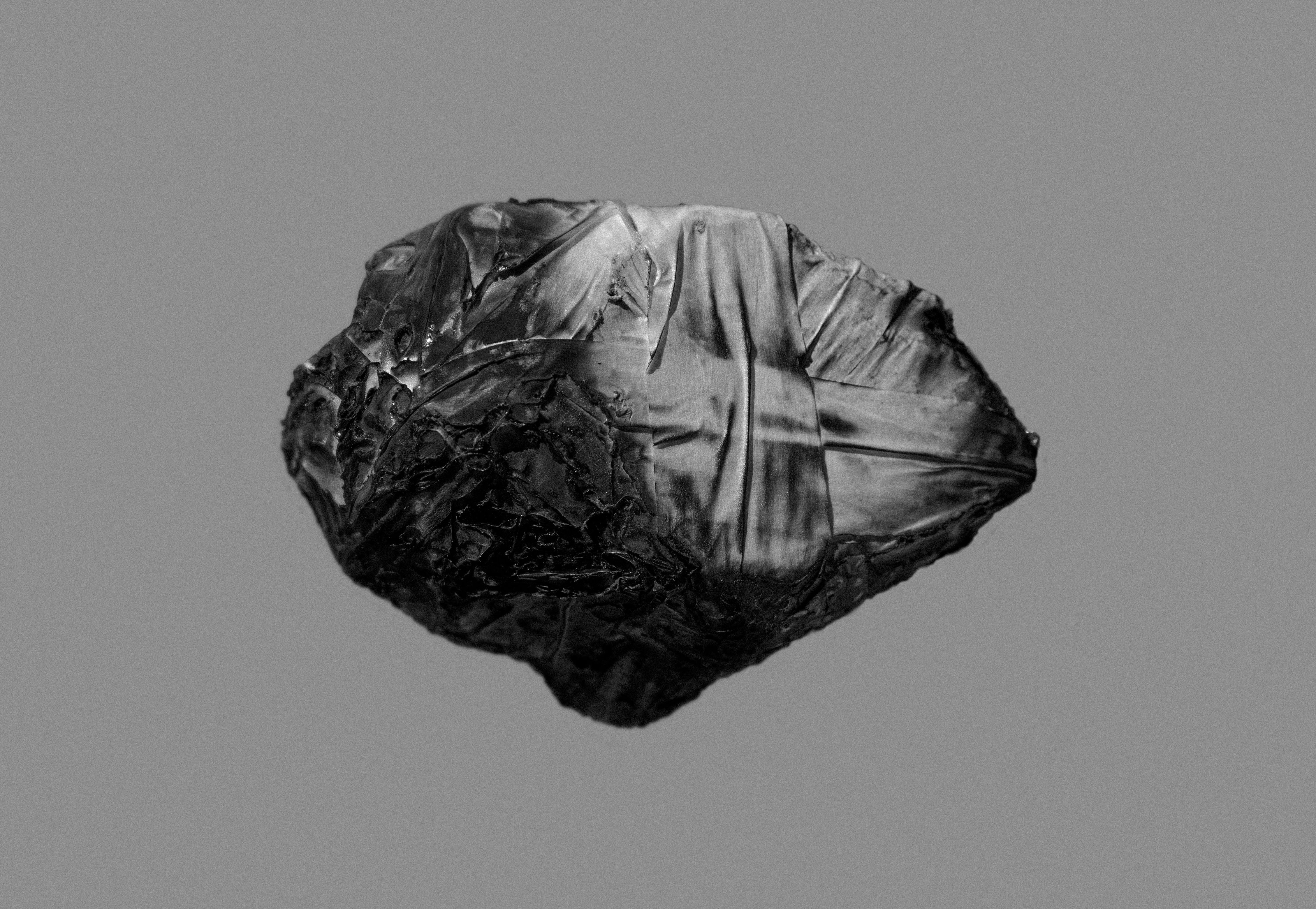 On Hansen Photography black and white abstract still life rock dark stone grey