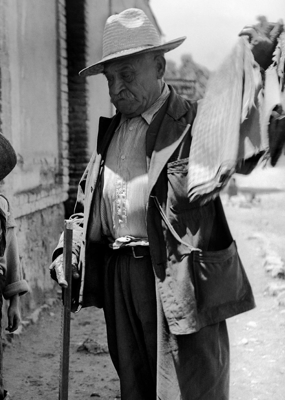 Thumbnail: Frida and the textile seller, Coyoacan, 1941, 2025  Print on Moab Juniper Baryta Rag 305gr Paper  Black and white photography