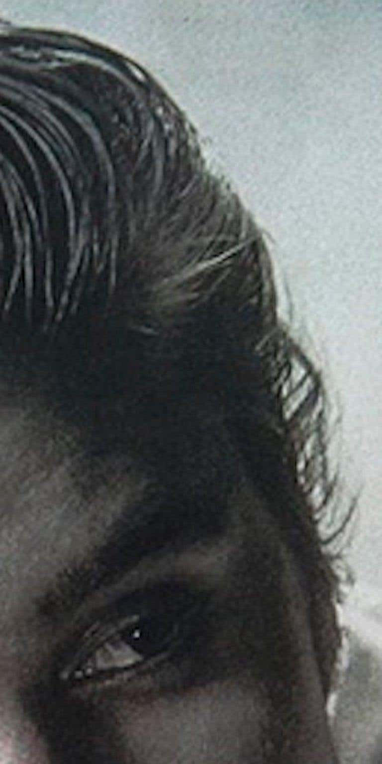 Thumbnail: Elvis archival photograph with surreal digital editing, rock legend universe