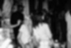 Black and white photograph of crowded rococo interior with masked guests at Vogue France party, Arslan Sukan La Notte series