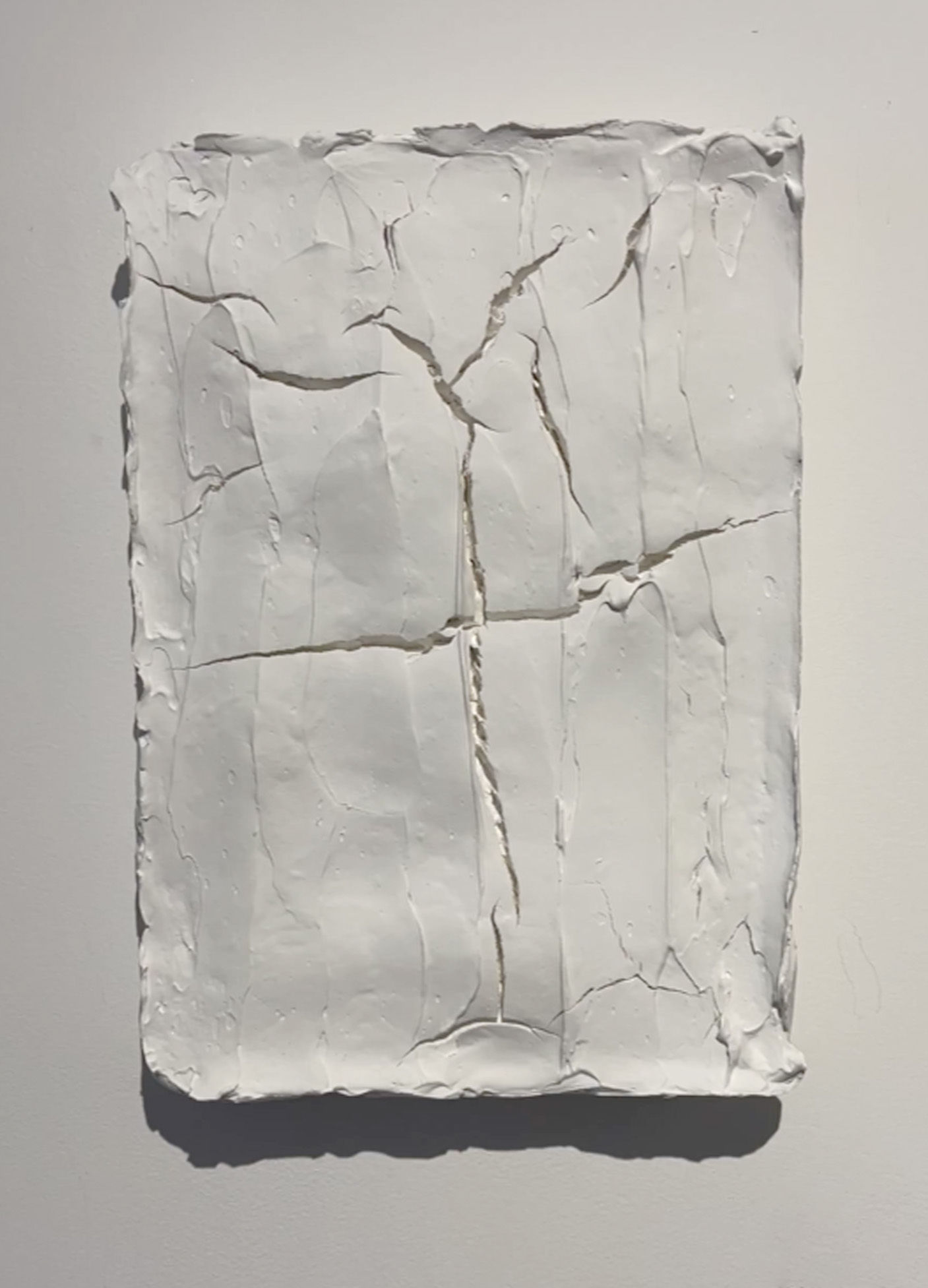Plaster on canvas abstract wall sculpture Rodrigo Zampol abstraction, volumes, cracks, lights, and shadows