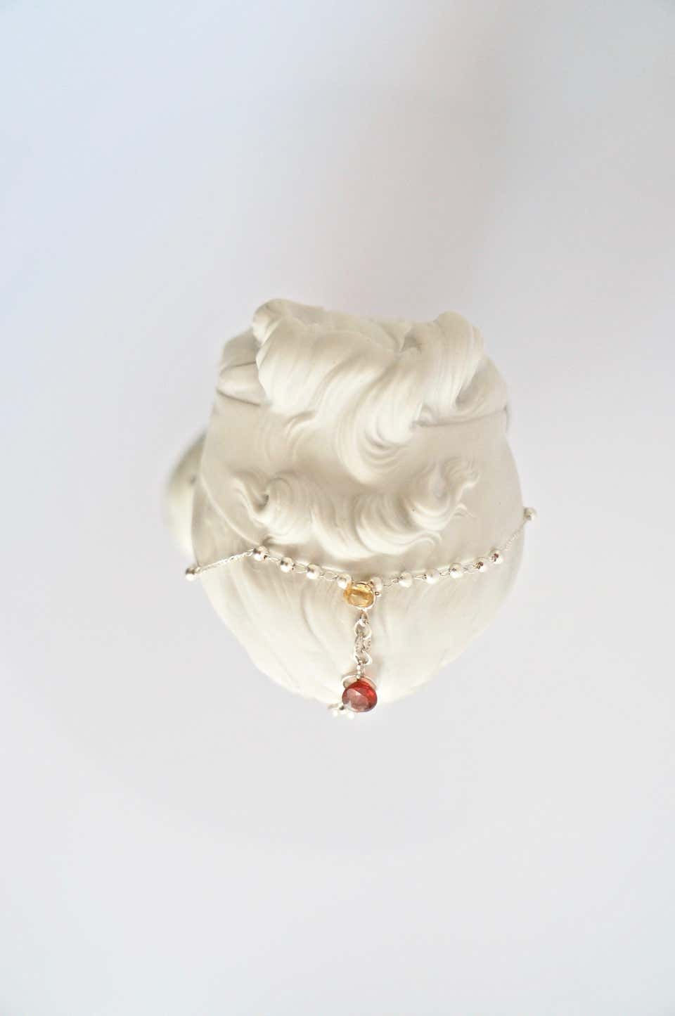 Thumbnail: Untitled #10 (female bust), 2016, sculpture, gold, silver, leather, and rose quartz by the artist