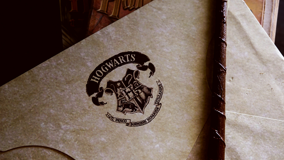 The symbol for "Hogwarts's School of Witchcraft and Wizardry", as the harry potter soundtrack boasted the first alternative rock song with dirty dancing!