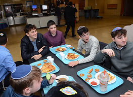 Students eating together in a school cafeteria