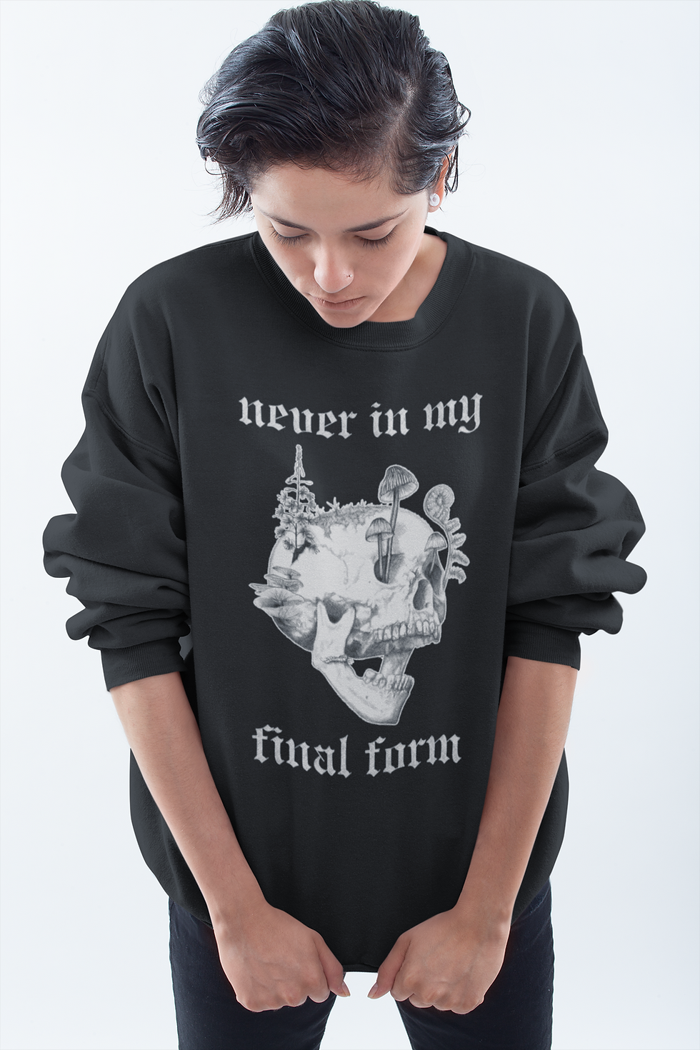 Thumbnail: black sweater featuring illustrated skull with mushrooms and plants growing from it. Text reads 'never in my final form'