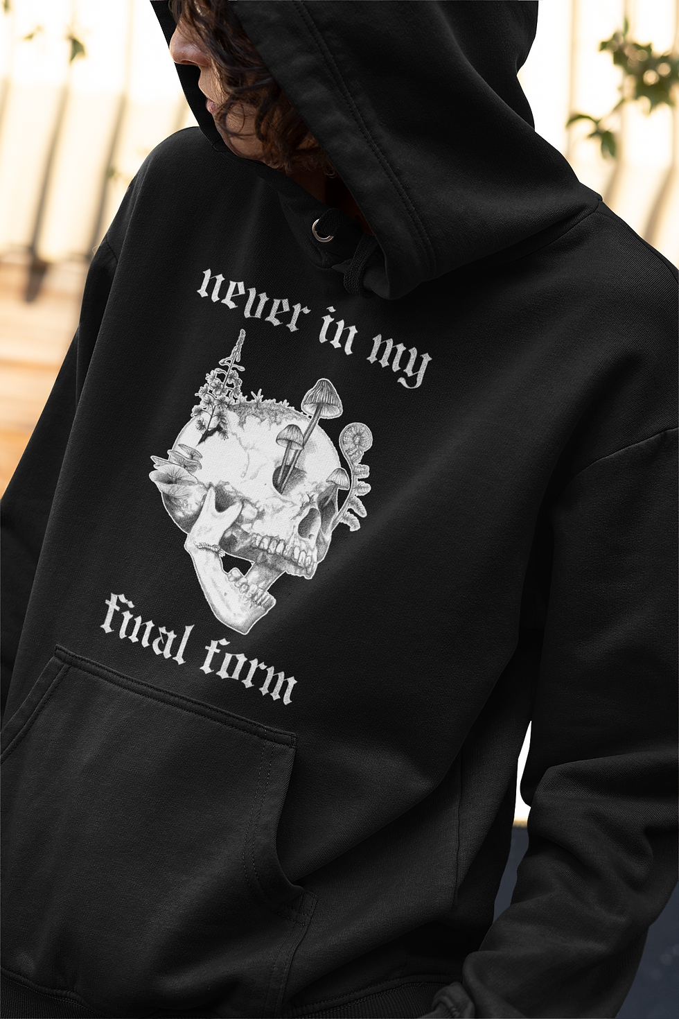 Thumbnail: black hoodie featuring illustrated skull with mushrooms and plants growing from it. Text reads 'never in my final form'