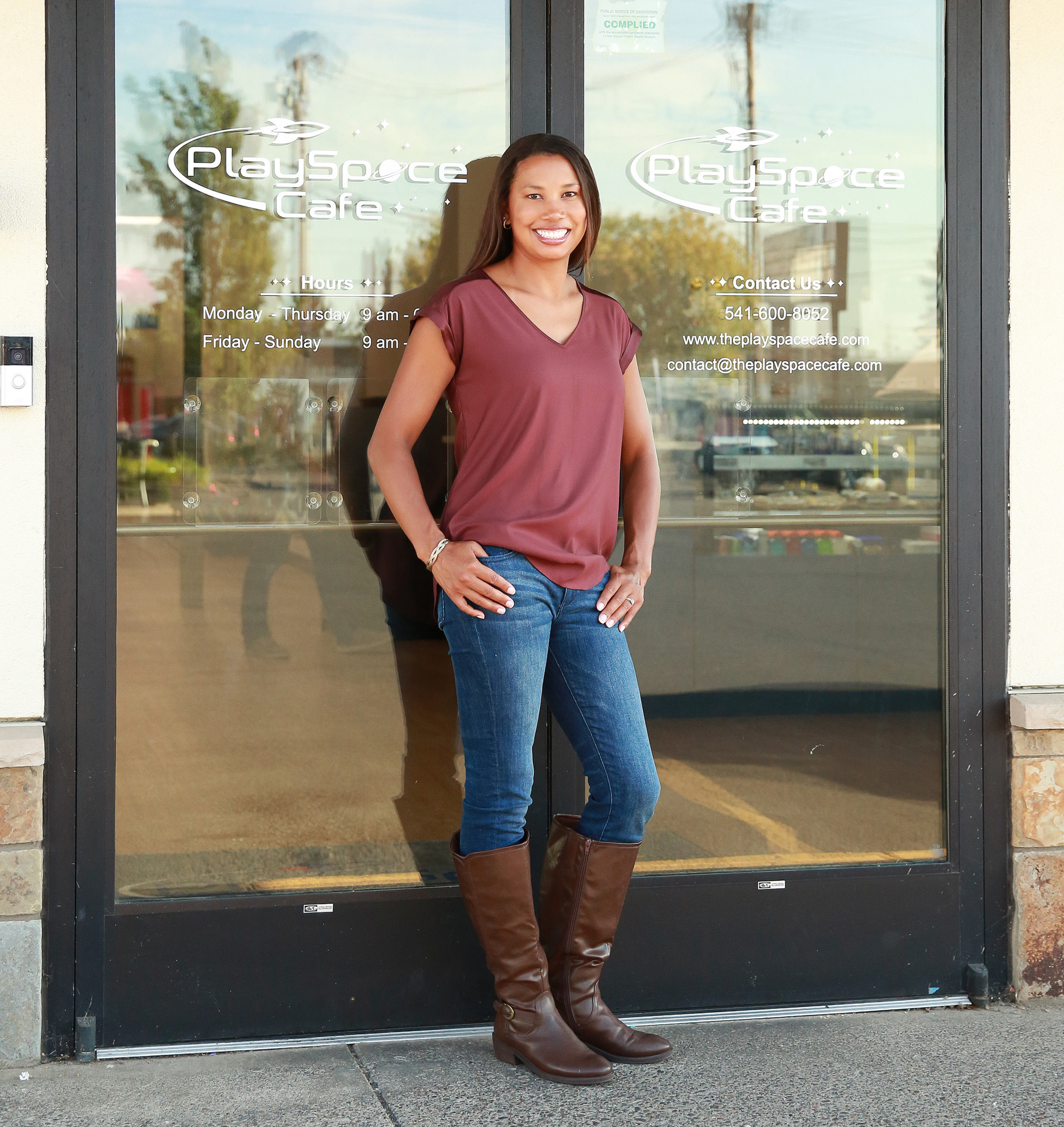 woman in front of doors