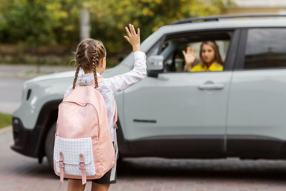kid being dropped off to school by mom