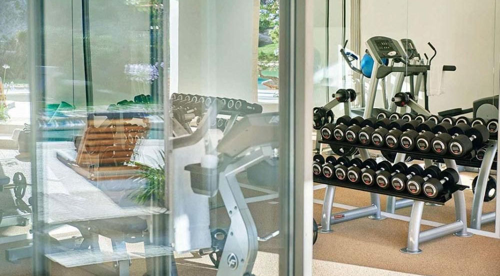 Villa Sa Ferradura private island luxury estate in Sant Miquel Bay, Ibiza, exclusive waterfront property surrounded by Mediterranean Sea and natural reserve.