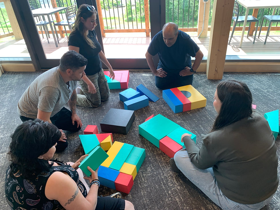 Small group completing a Stumbling Blocks Challenge