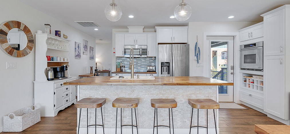 Fully stocked kitchen with a coffee and tea bar