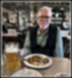 Tucking in to wurstchens at Augustiner