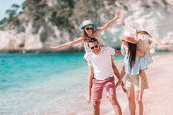 happy-beautiful-family-with-kids-beach.jpg