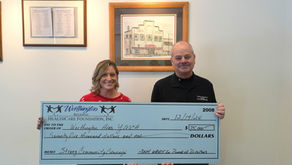 WRHCF presents check to Worthington Area YMCA