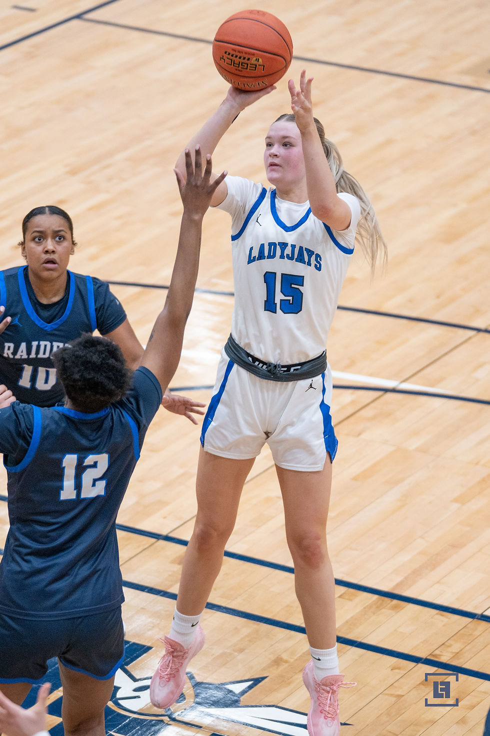 Katrina Schutz is defended during Friday's game, in which she led the Lady Jays in scoring and rebounding.