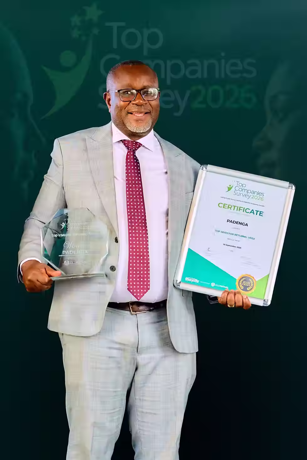 Oliver Kamunkimu receiving the award on behalf of Padenga Holdings Limited