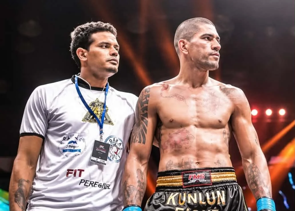 Fellipe Lima alongside Alex Pereira at a fight event.