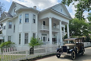 Front of Oaklea and Model A Woody