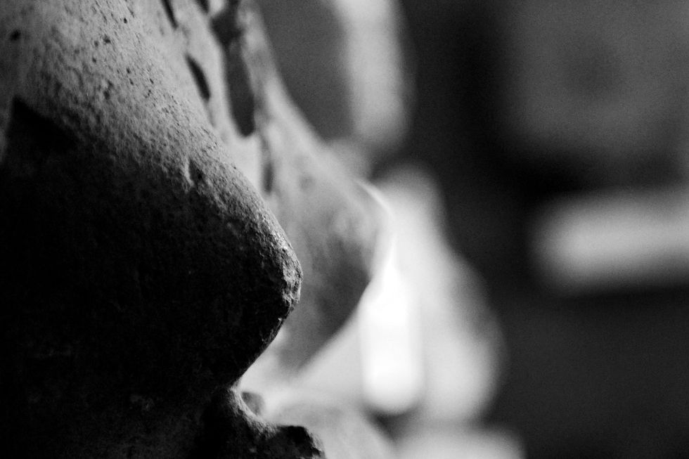 Limestone torso of a woman