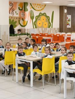 Second grade students in a  Russian school with their ESL teacher.