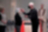 Priest giving woman ashes, Ash Wednesday