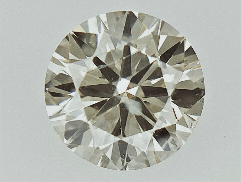 0.30 CTS , Round Brilliant Cut , Light Colored Diamond
