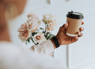black-woman-holding-coffee-go.jpg
