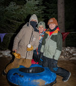 Cosmic Tubing under the lights and Winter Fun Days at Yellowstone Alliance Adventures south of Bozeman, Montana. Great winter fun activity for families, teens, adults. Recreation for all!