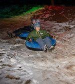 Cosmic Tubing under the lights and Winter Fun Days at Yellowstone Alliance Adventures south of Bozeman, Montana. Great winter fun activity for families, teens, adults. Recreation for all!