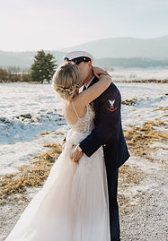 bride and groom picture in the snow