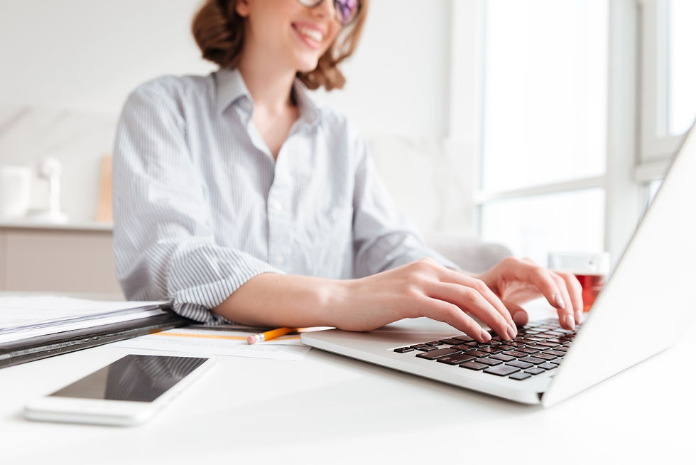 brunette-woman-typing-email-laptop-computer-while-sitting-home-selective-focus-hand.jpg