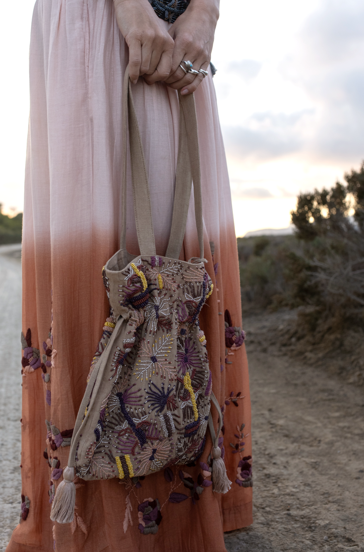 Hand beaded pouch bag in almond