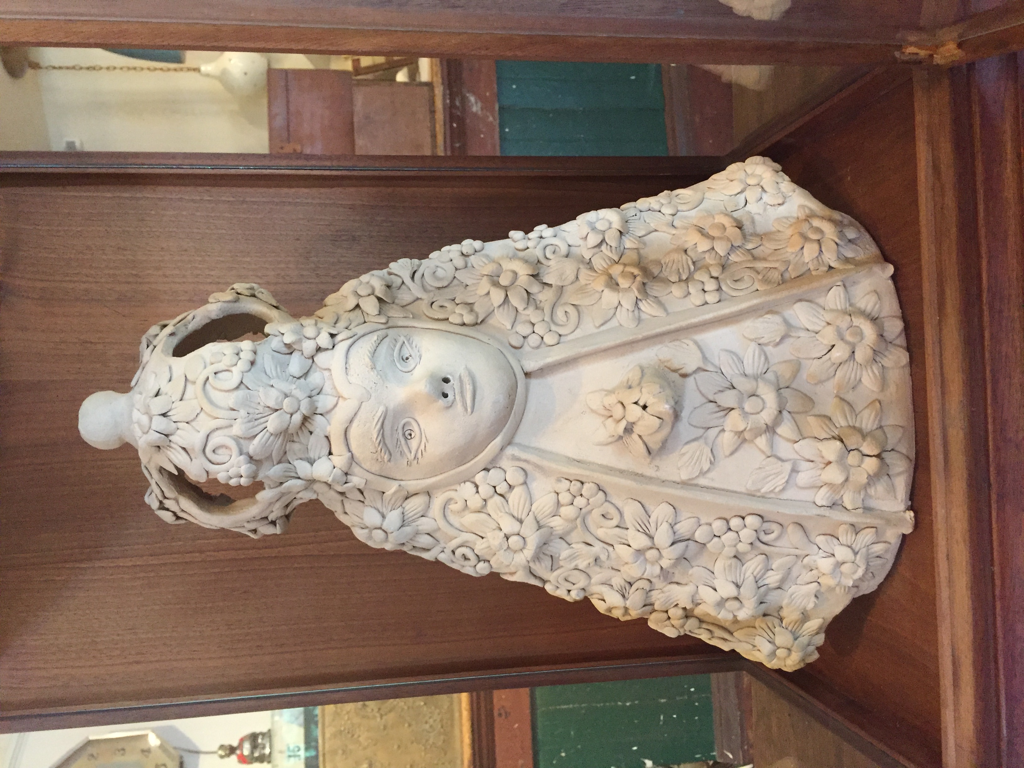 St. Theresa and Display Case