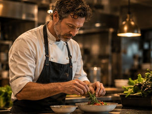 Independent restaurant chef working with fresh ingredients in a professional kitchen