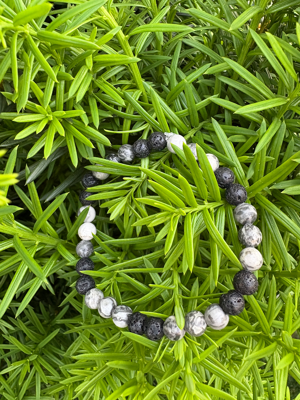 Mapstone and black lava stone beads. Mapstone is grey/white tones. 18cm in size