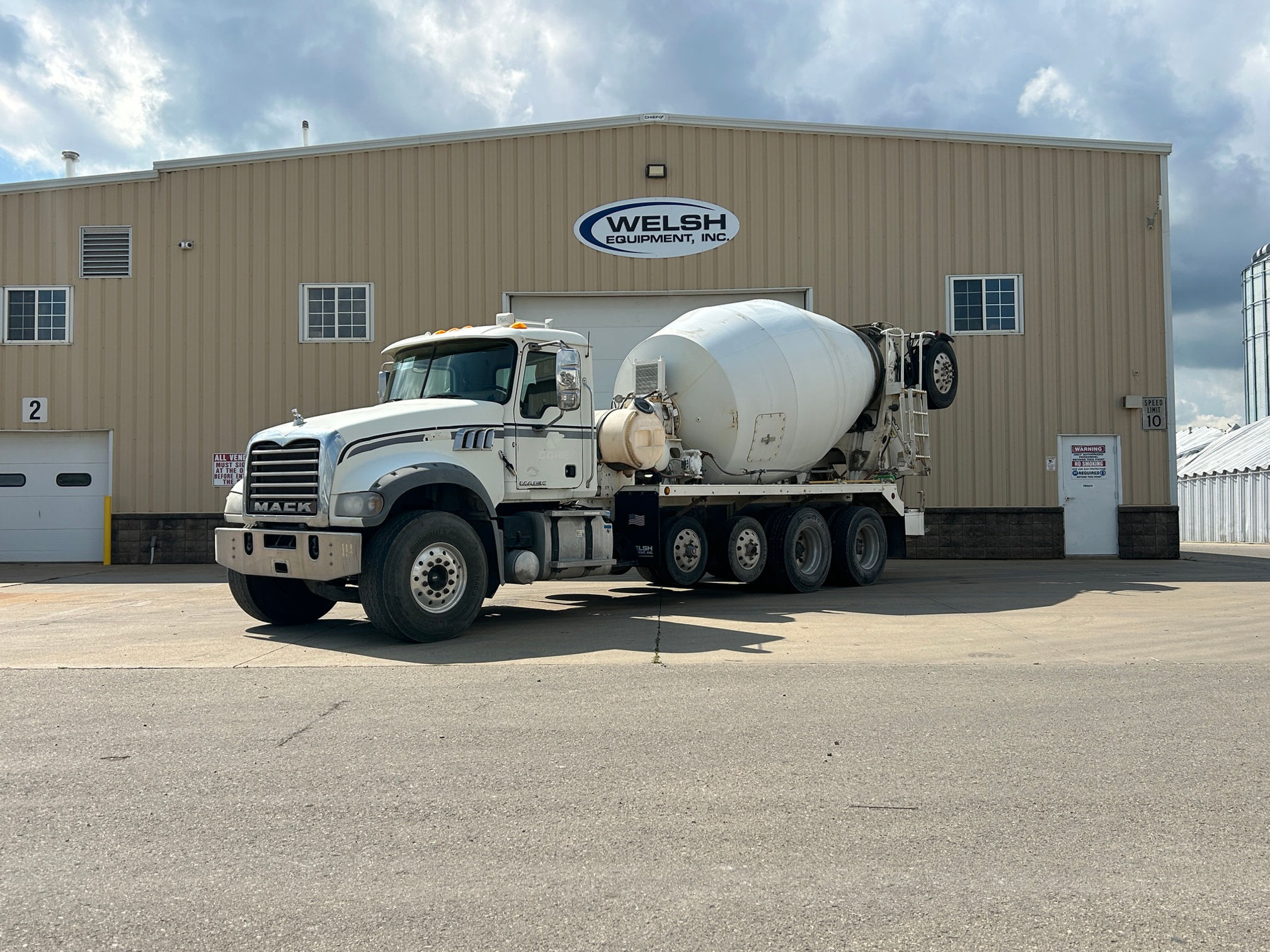 (1) - 2014 Mack GU713 w/ 11 yd MTM BridgeMaster Mixer w/ 2 Pushers