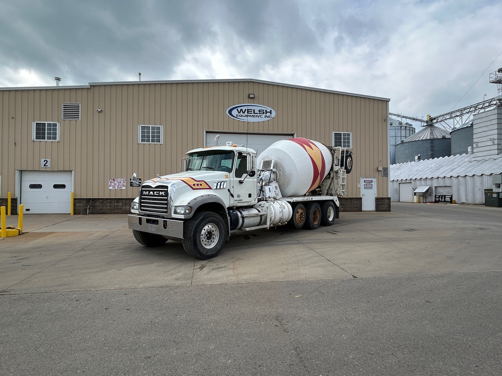 (4) - 2017 Mack GU713 w/ 11 yd Housby Bridge Mixer w/ 1 Pusher