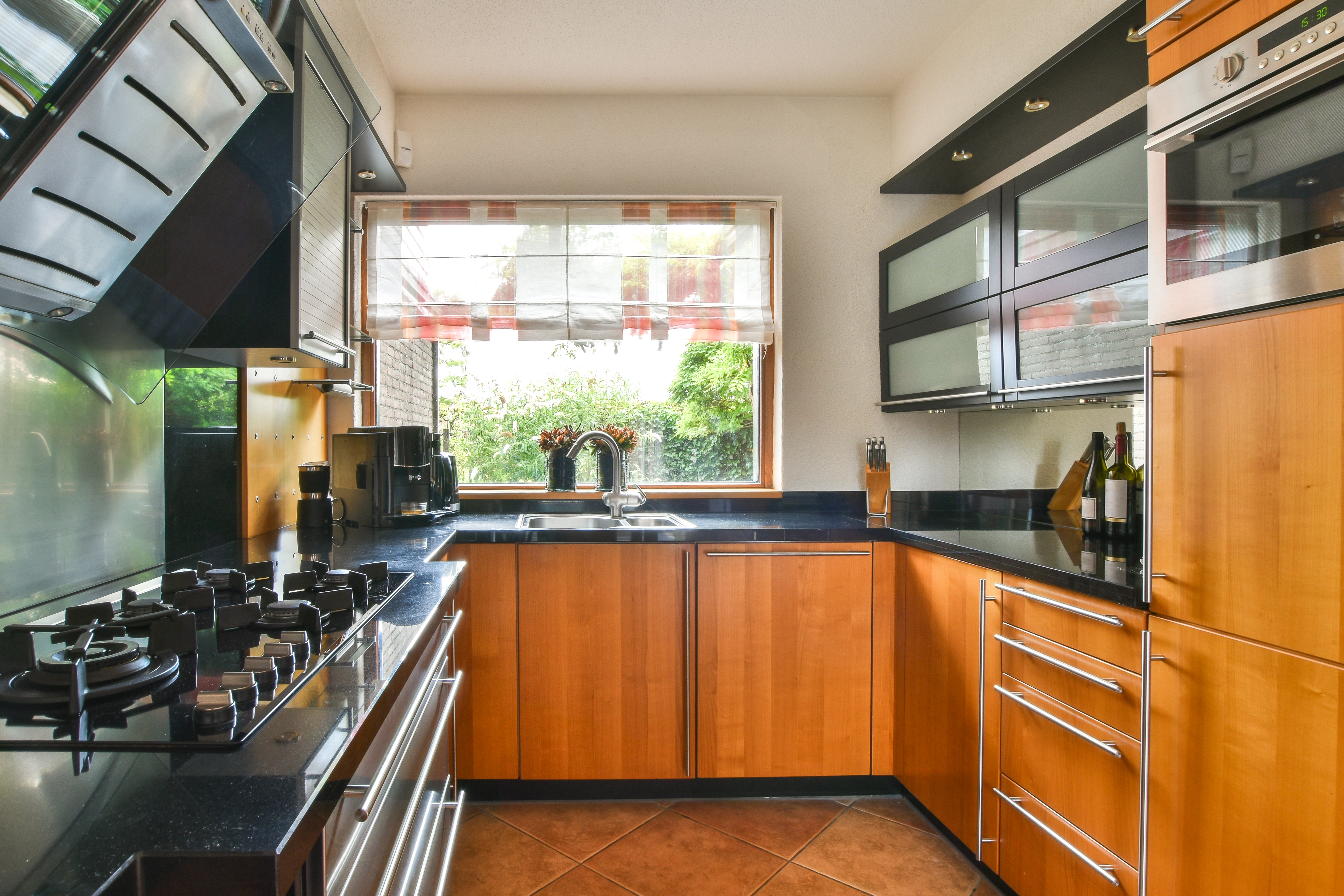 modern-kitchen-interior-with-wood-cabinets-and-gra-2026-03-18-10-34-35-utc.jpg