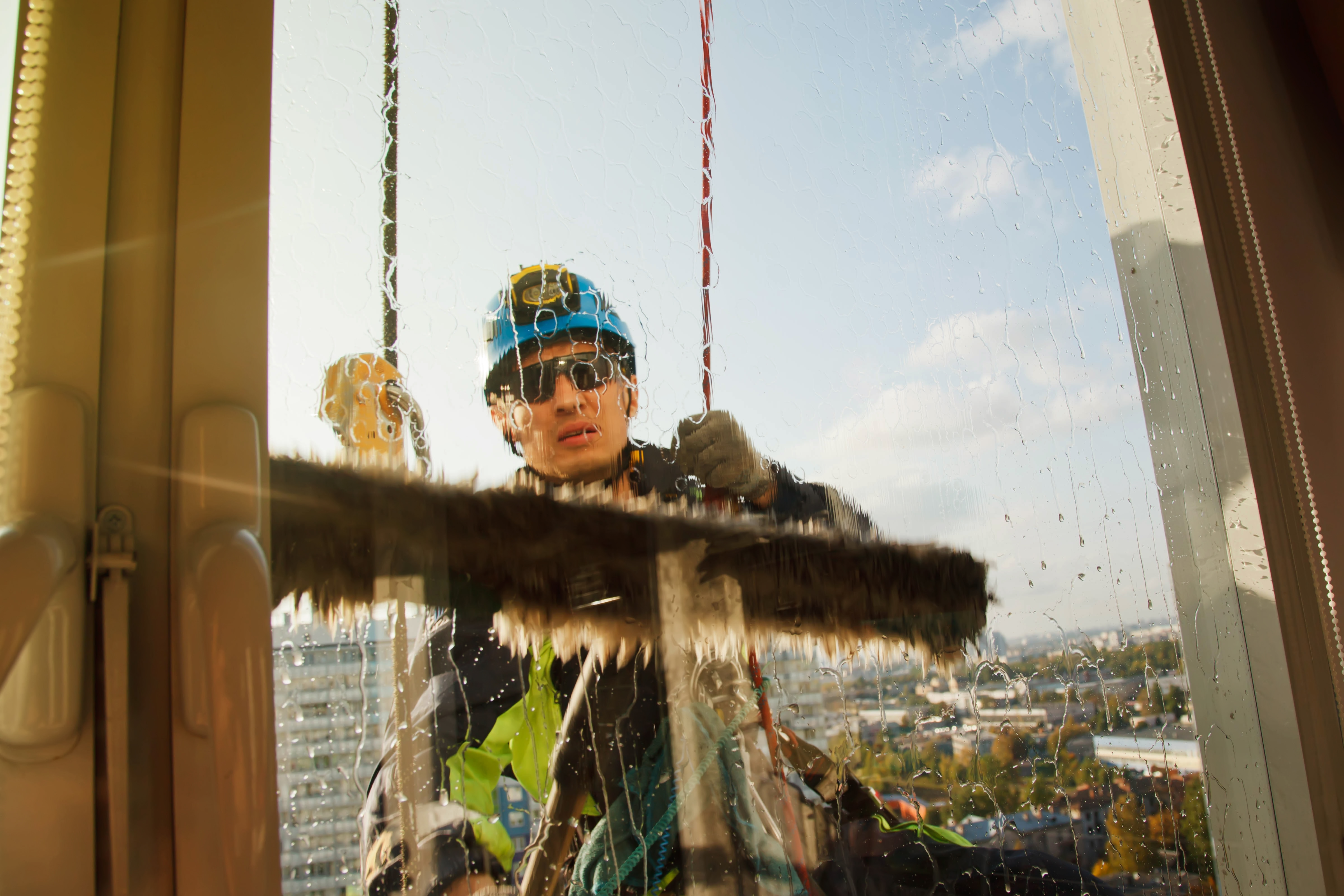 window-cleaner-at-work-on-tall-building-2026-03-24-03-18-40-utc.jpg