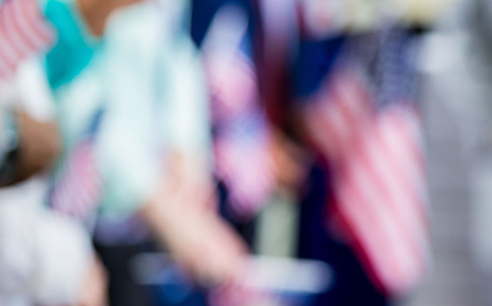 Blurred American flags waving