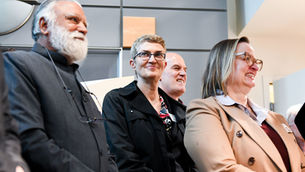 Jodi Joyce looking over the crowd of community supporters who attended The Way Station ribbon cutting event.