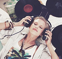 Woman Surrounded by Records