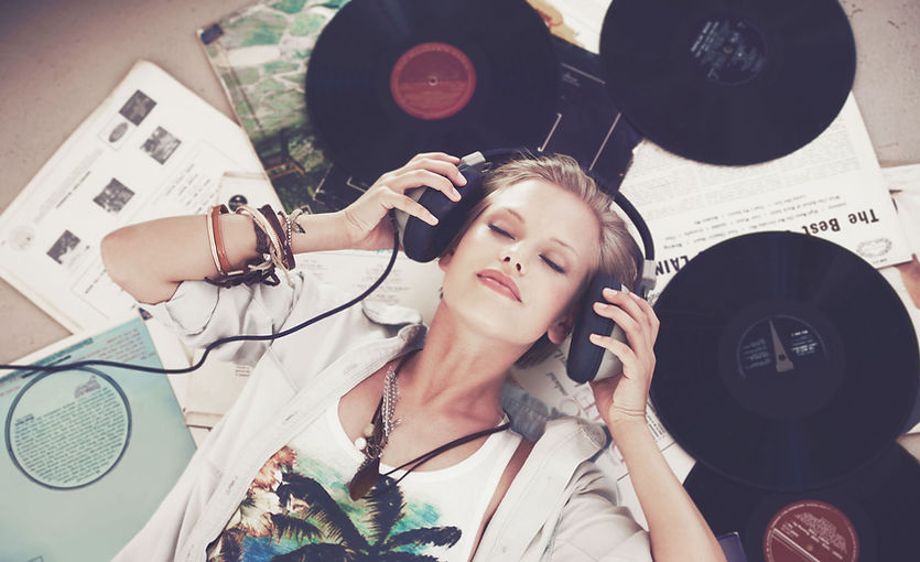 Woman Surrounded by Records