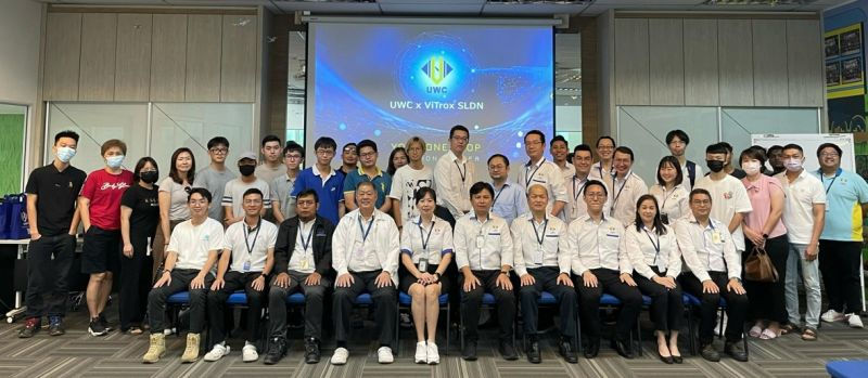 Group photo of ViTrox SLDN students with parents and representatives from UWC.