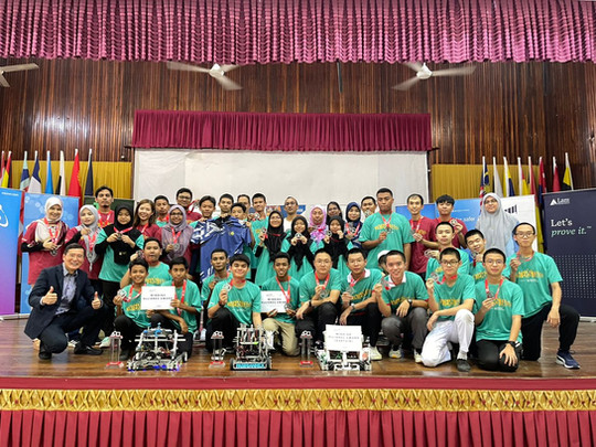 First Tech Challenge Participants Group Photo with Coach and Organizer