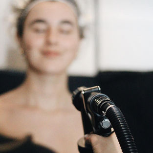 Can a Spray Tan Really Make You Look Slimmer?