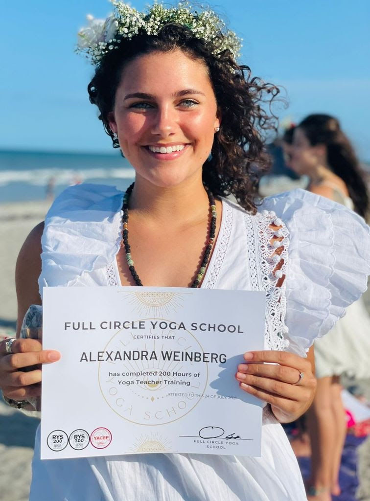 Yoga student graduating yoga teacher training