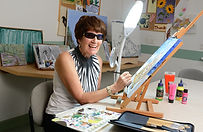 Sensory Matters attendee painting in art class