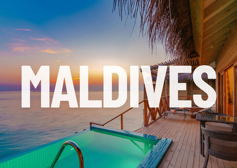 Luxury tropical getaway in the Maldives, with overwater bungalows and crystal-clear waters.