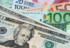 ECB lowers rates, Euro edges lower